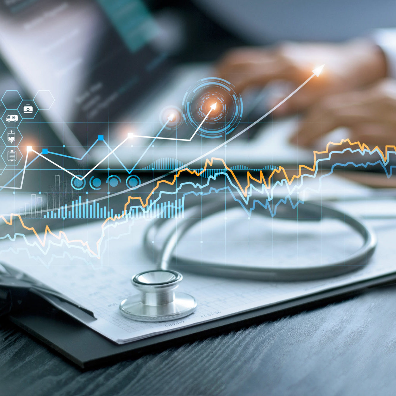 Healthcare business graph data and growth, Stethoscope with doctor's health report clipboard on table, Medical examination and doctor analyzing medical report on laptop screen.